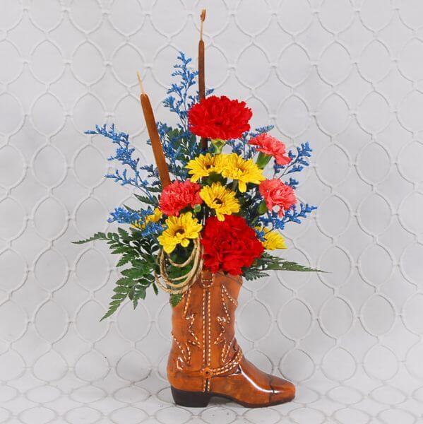 cowboy boots with flowers in them